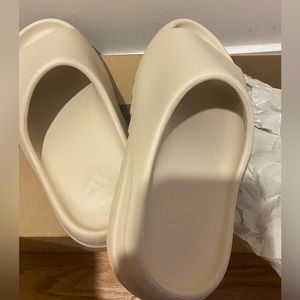 Worn a couple times, little bit of wear and tear on bottom